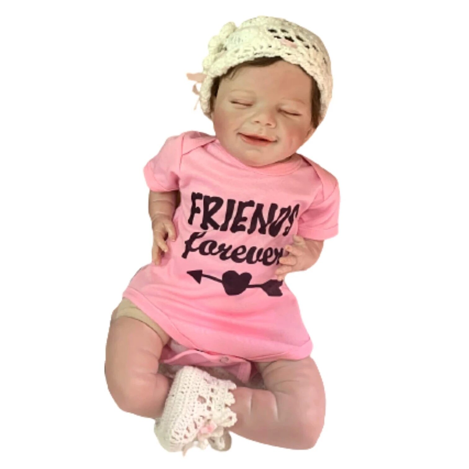 Le bébé reborn Théa a les yeux clos.